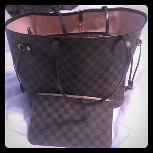 Auth Louis Vuitton Neverfull MM with wristlet.